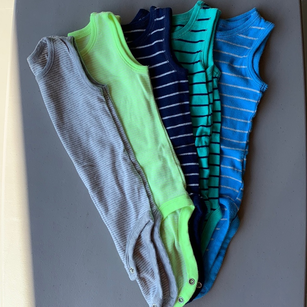 Boys sleeveless onesies. 12m. Excellent condition. Great for layering.